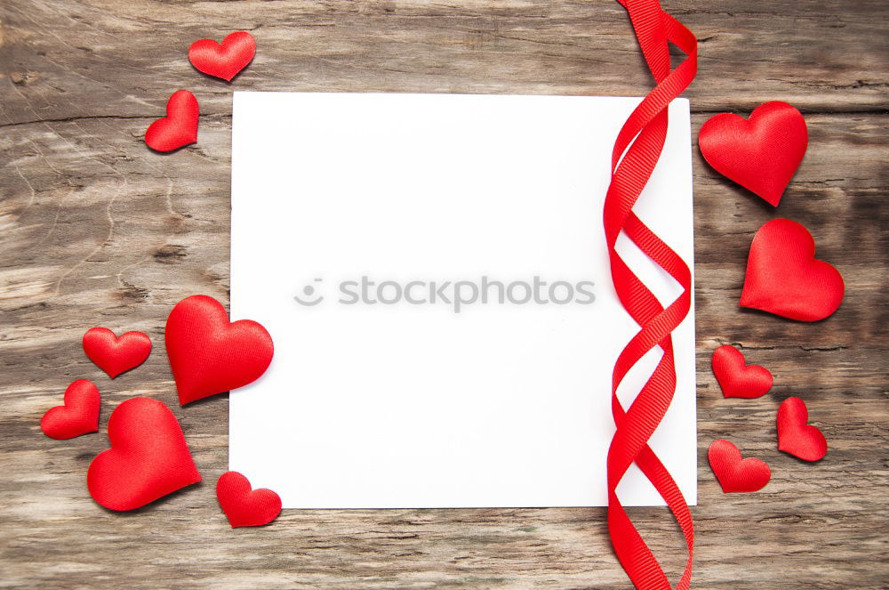 Similar – Image, Stock Photo Present with heart shape and seasonal plant with red leaves