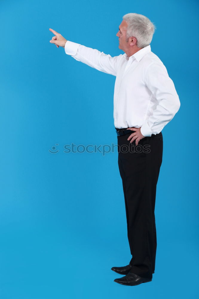 Image, Stock Photo Portrait of a teenager rebellious man with a blue background