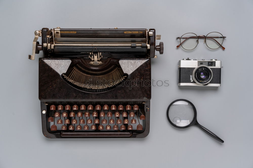 Similar – Traditional and old way of writing messages and taking photos, typewriter, camera, watch, pen, Vintage lamp on the desk