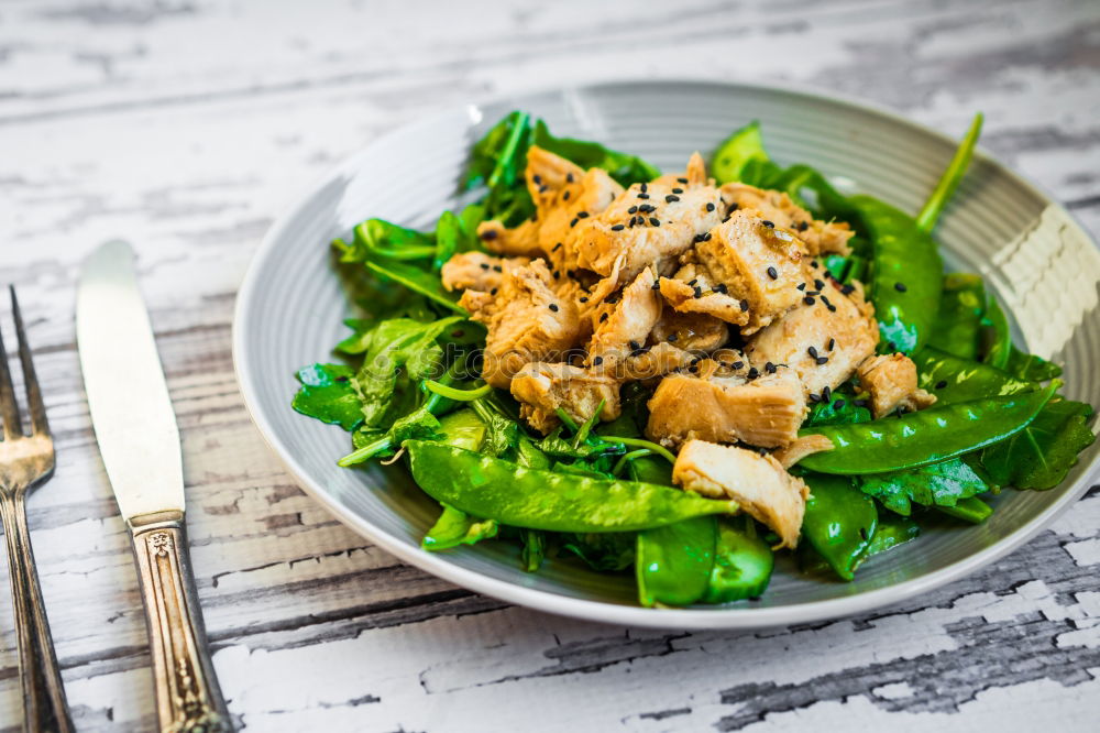 Similar – Image, Stock Photo Chicken salad with green mixed salad leaves