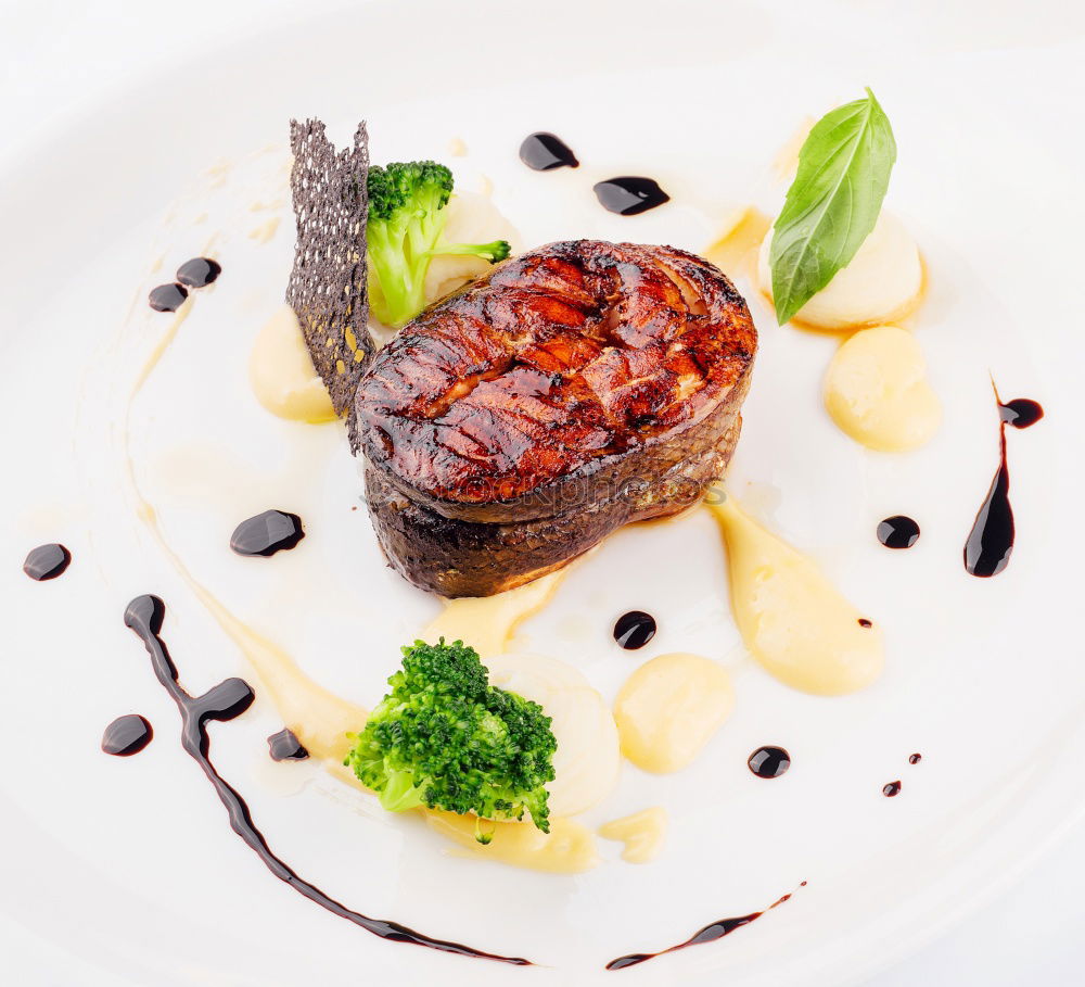 Similar – dinner with beef on a pure white dinner plate