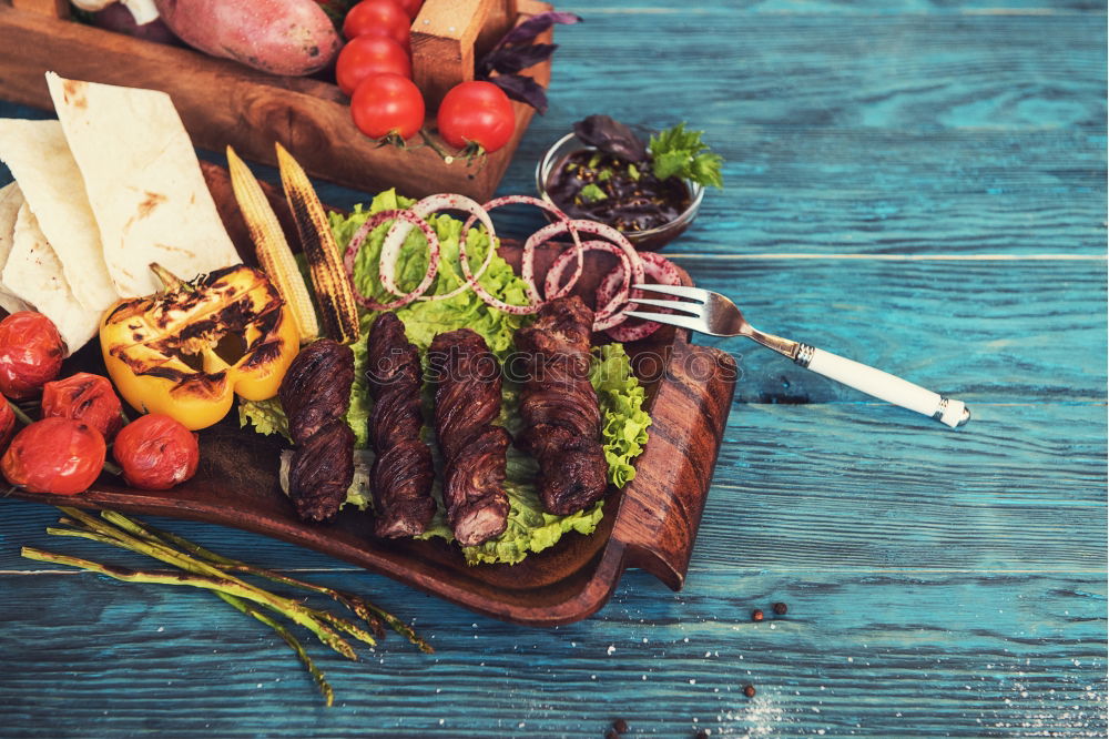 Similar – Image, Stock Photo Meat skewers with vegetables for grilling