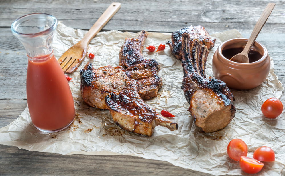 Similar – Meat skewers with pepperoni and barbecue sauce