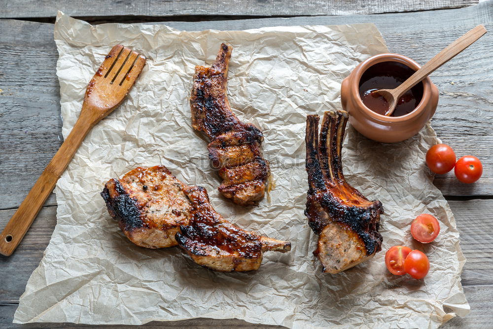 Similar – Meat skewers with pepperoni and barbecue sauce