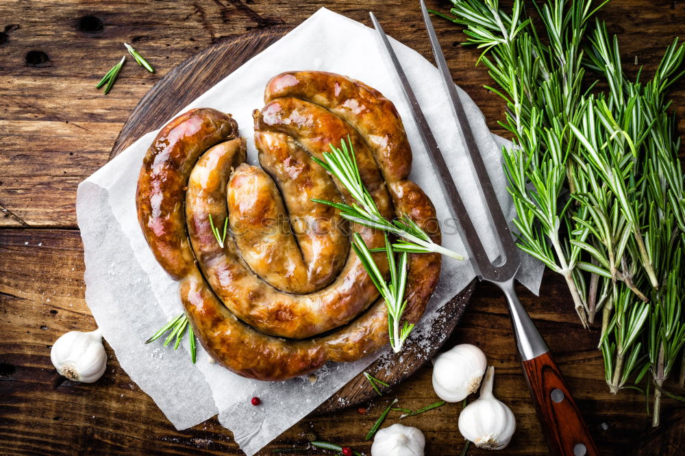 Similar – Bratwurst with mashed potatoes and sauerkraut