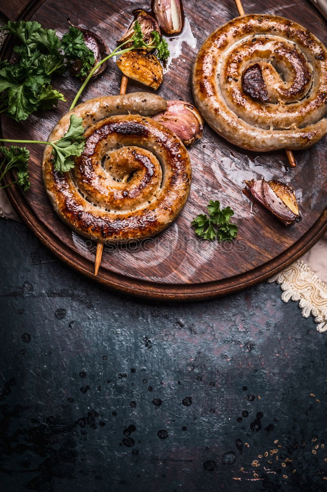 Similar – Bratwurst with potatoes and sauerkraut