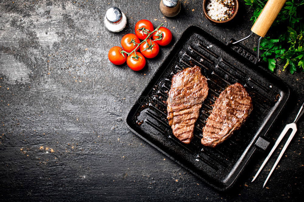 Similar – Image, Stock Photo Ribeye steak on grill iron pan