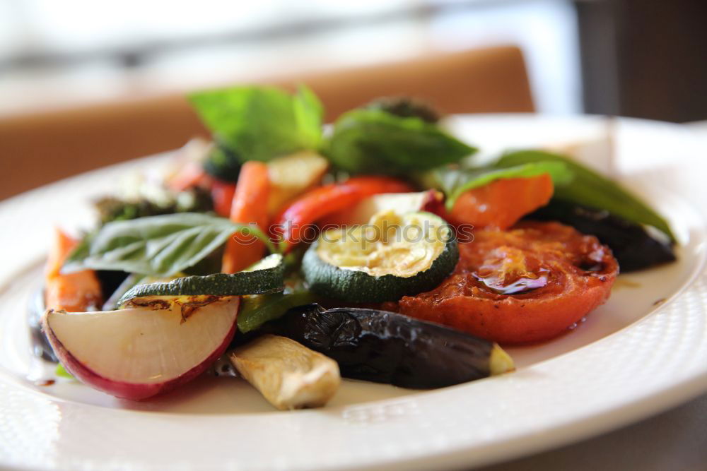 Similar – fresh salad on dark wooden table