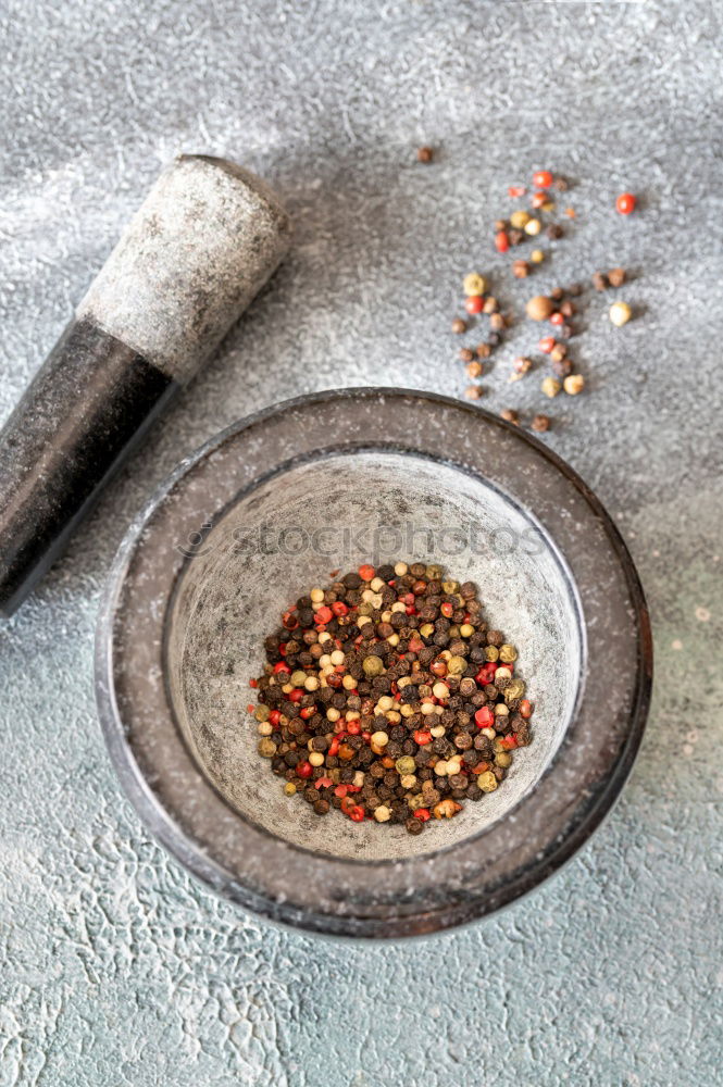 Similar – Table spice set with pepper mill and fresh herbs