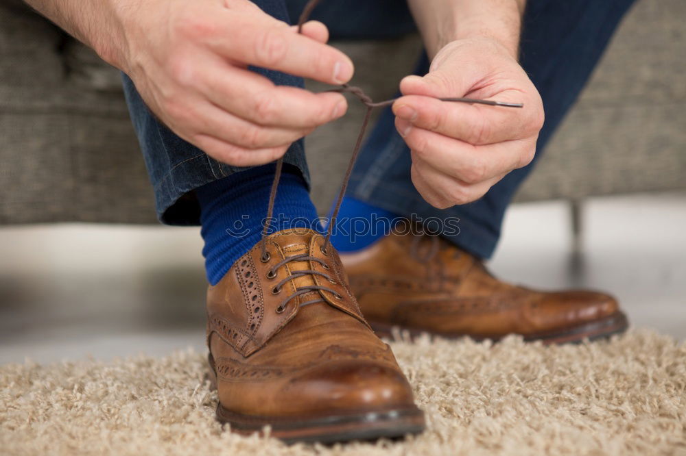 Similar – Image, Stock Photo Man wearing elegant boots