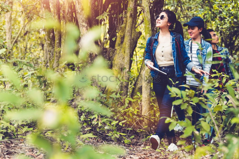 Similar – Image, Stock Photo Couple pausing while doing trekking