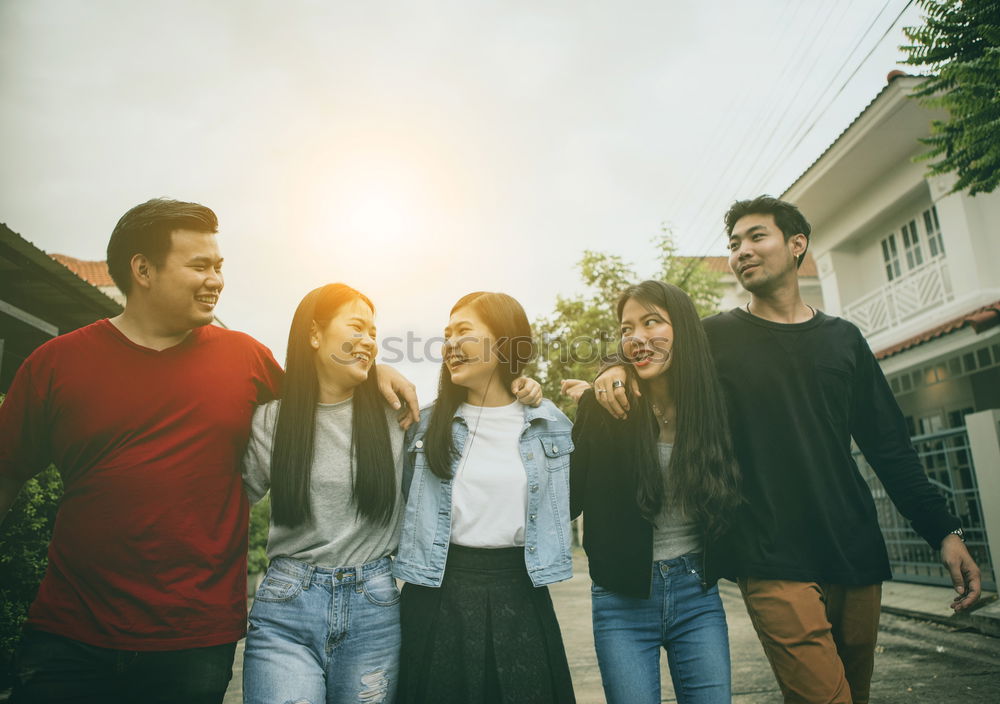 Similar – Image, Stock Photo Multi-ethnic group of young people having fun together outdoors