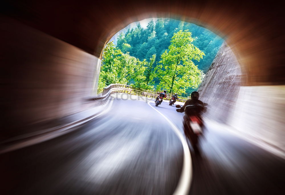 Similar – Image, Stock Photo Cyclist riding along a paved mountain road