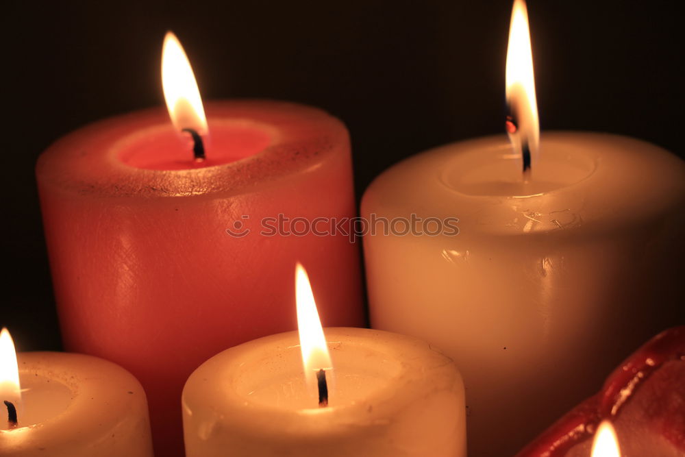 Similar – Image, Stock Photo A match lights the fire of many candles