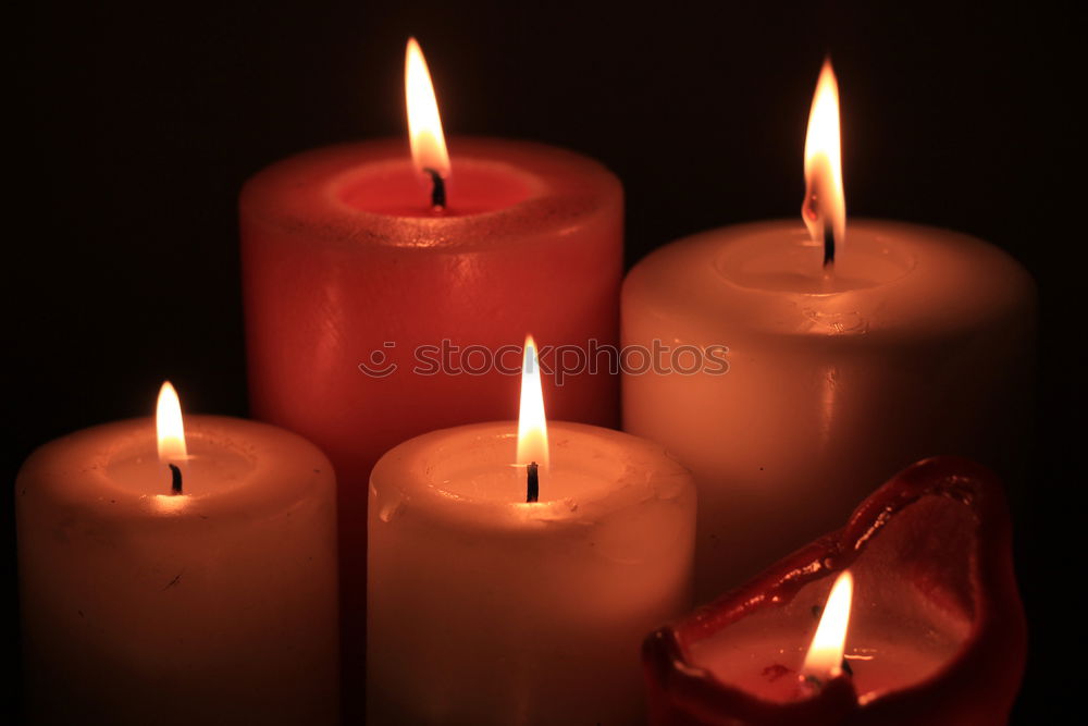 Similar – Many colourful burning candles