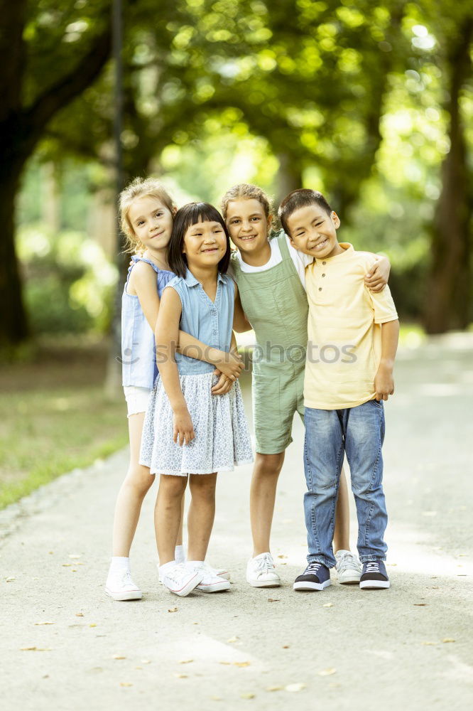 Similar – Image, Stock Photo Three kids playing with a tree painted on a wall