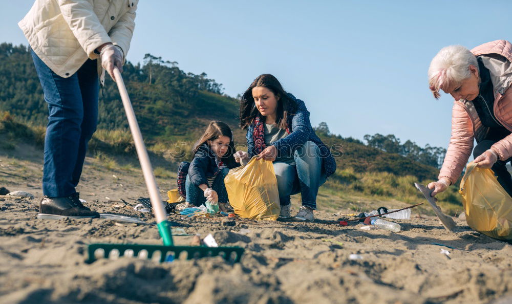 Similar – Young man cleaning the beach