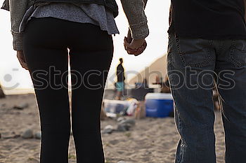 Similar – Image, Stock Photo Young couple walking through the city