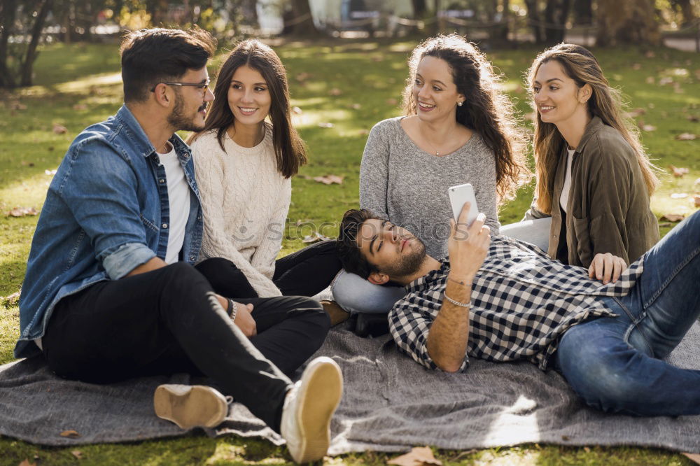 Similar – Image, Stock Photo Group of young people with smartphone and tablet computers outdoors