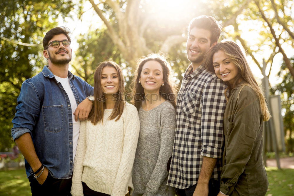 Similar – Group of young people together outdoors in urban park