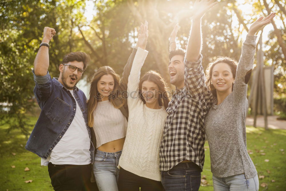 Similar – Group of young people together outdoors in urban park