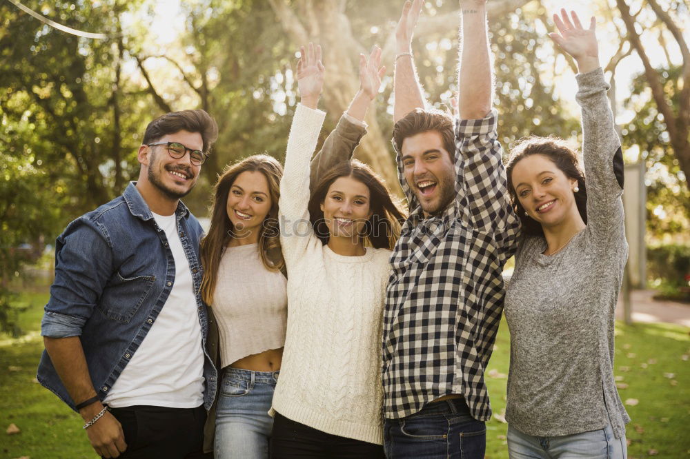 Group of young people together outdoors in urban park