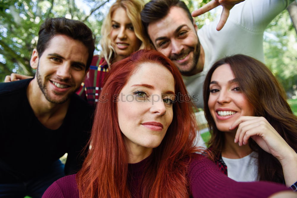 Similar – Image, Stock Photo Group of friends taking selfie in urban background.