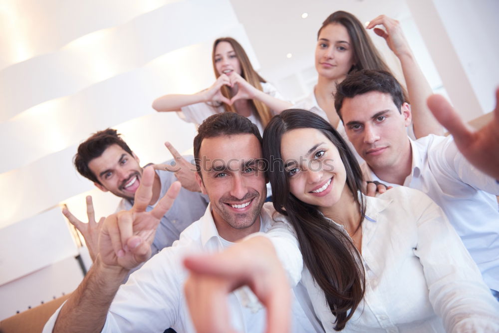 Similar – Group of friends taking selfie in urban park