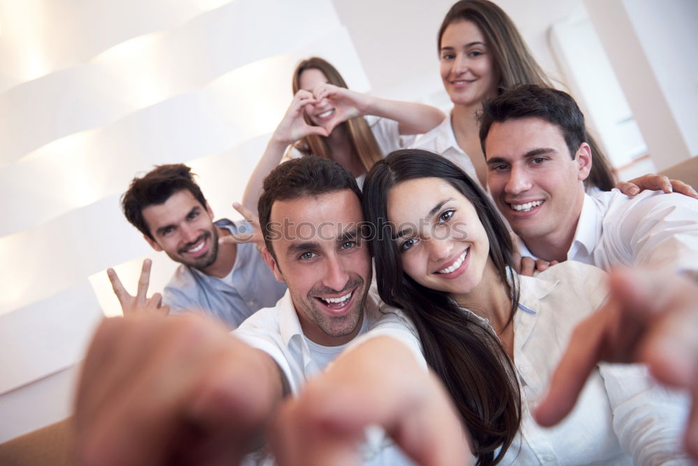 Similar – Group of friends taking selfie in urban park