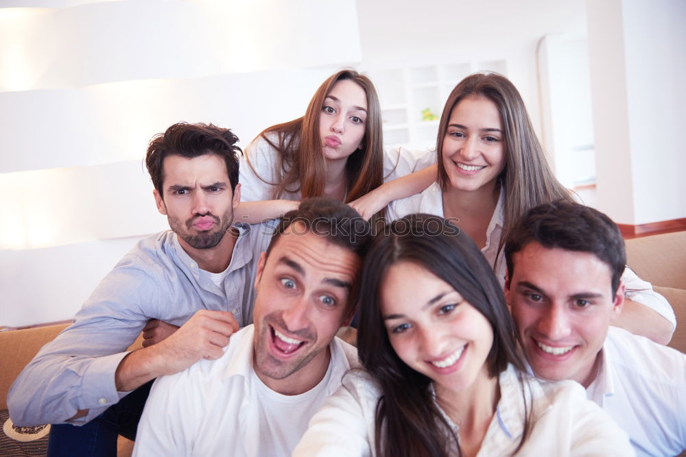 Similar – Group of friends taking selfie in urban park