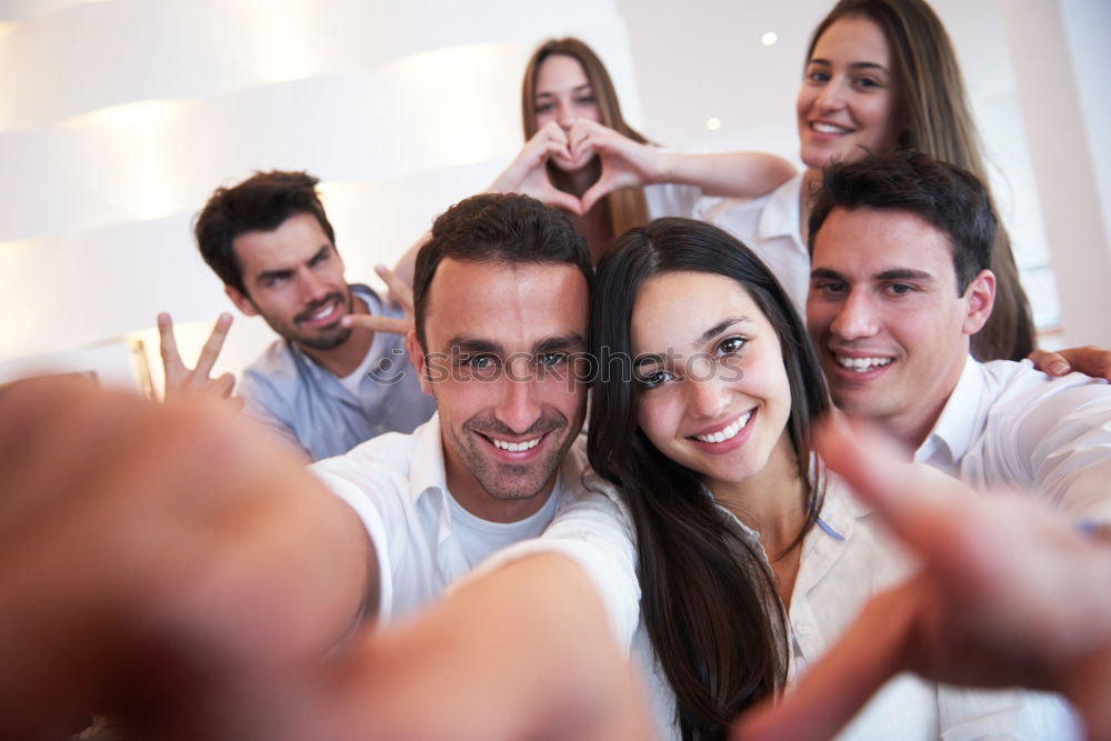 Similar – Group of friends taking selfie in urban park