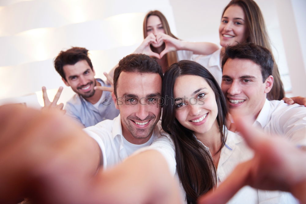 Similar – Group of friends taking selfie in urban park