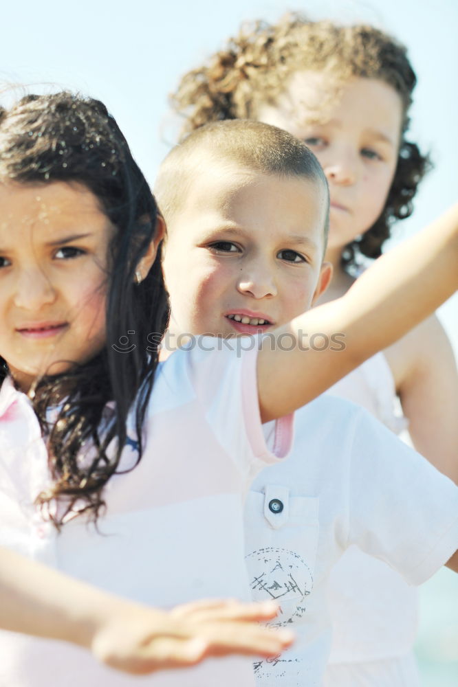 Similar – Two kids riding together wtih a skate board