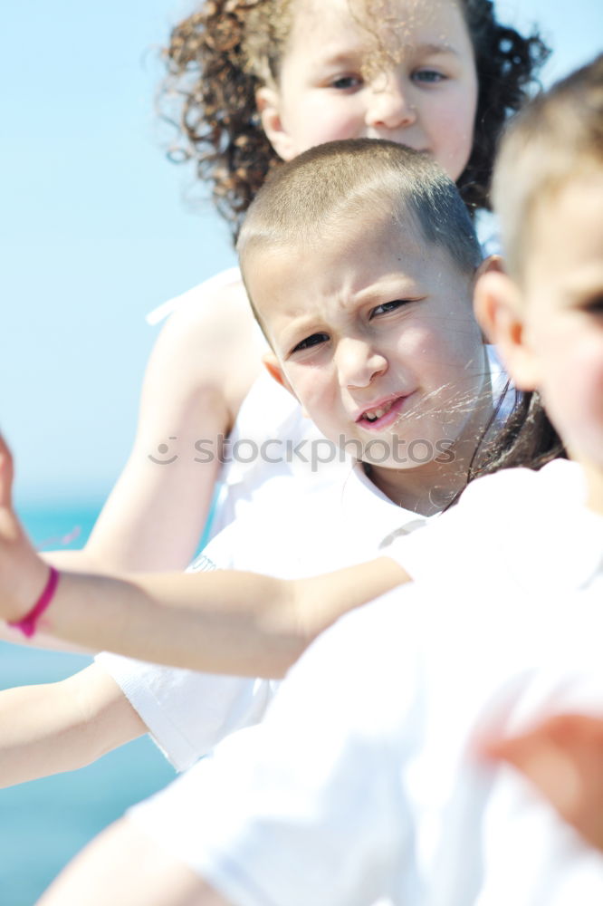 Similar – Two kids riding together wtih a skate board