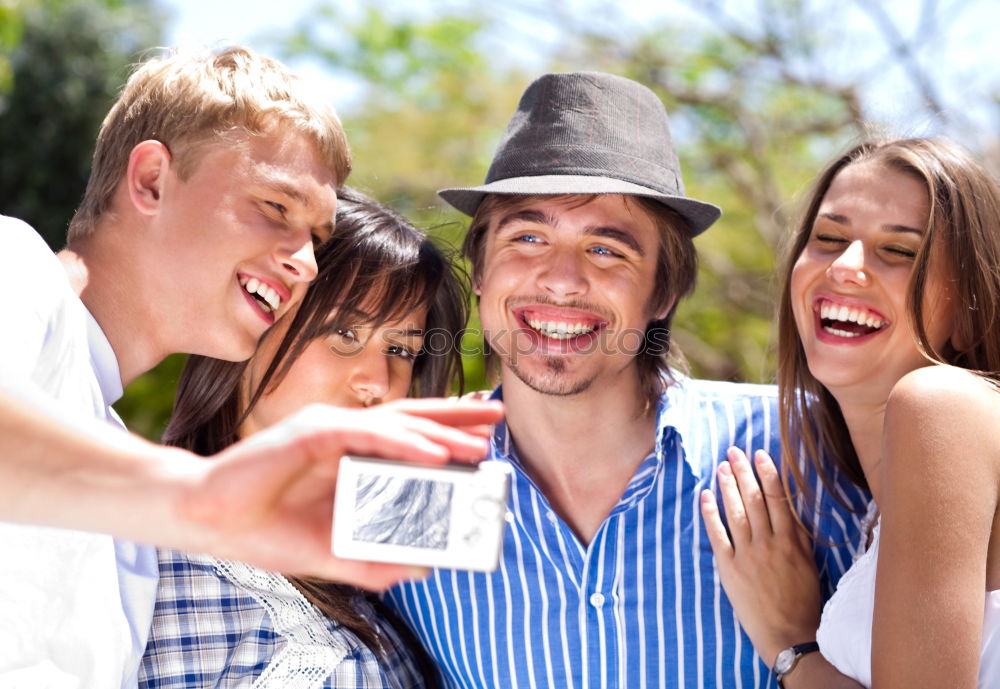 Image, Stock Photo Group of friends taking selfie in urban park