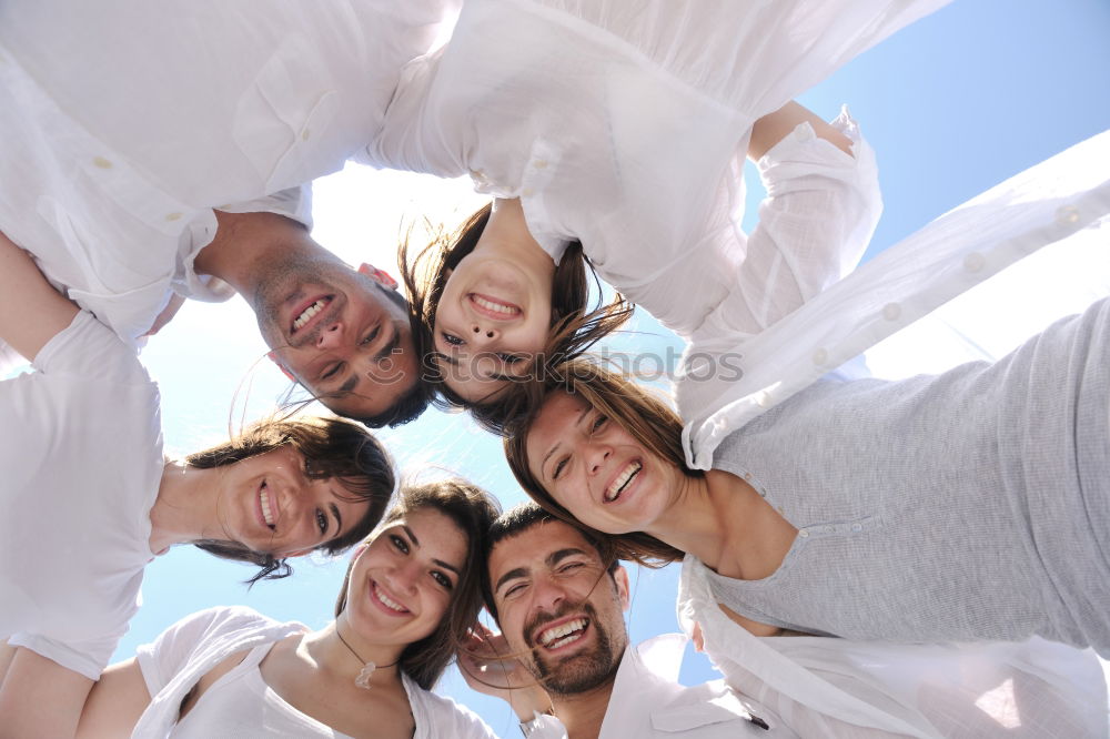 Similar – Group of young people together outdoors in urban park.