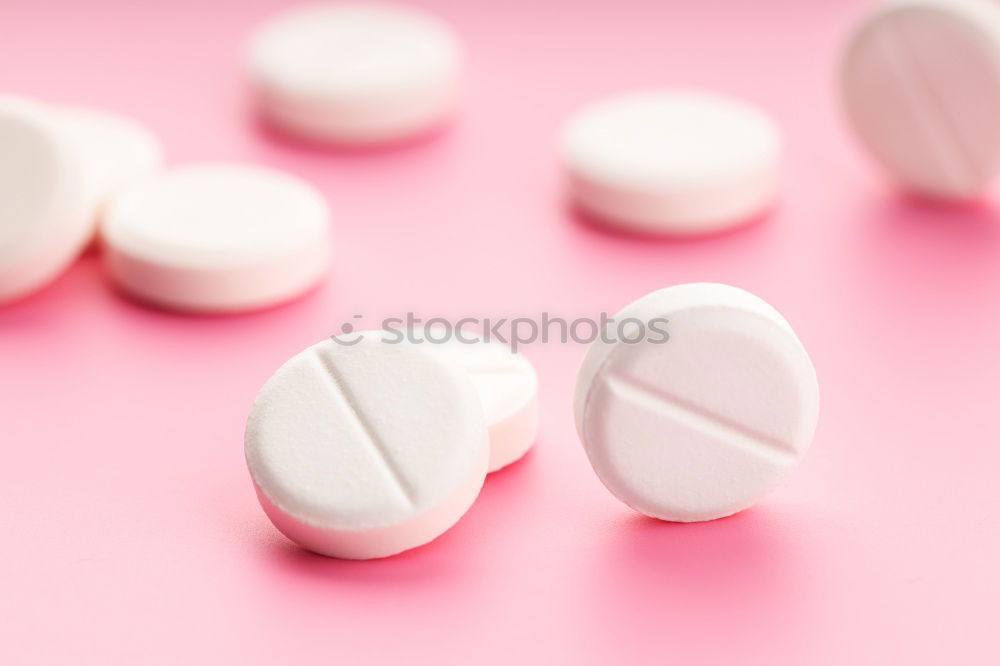 Similar – Pink tablets pill on blur blister pack of tablets pills on pink background. Prescription drugs. Woman health concept. Pharmaceutical industry. Online pharmacy banner. Drugs packaging. Treatment dose.