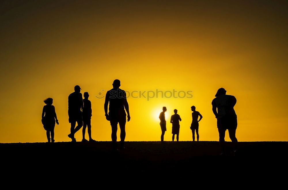 Similar – Image, Stock Photo Happy family standing in the park at the sunset time.