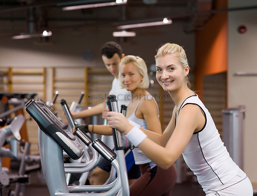 Similar – Image, Stock Photo Couple in a spinning class wearing sportswear.