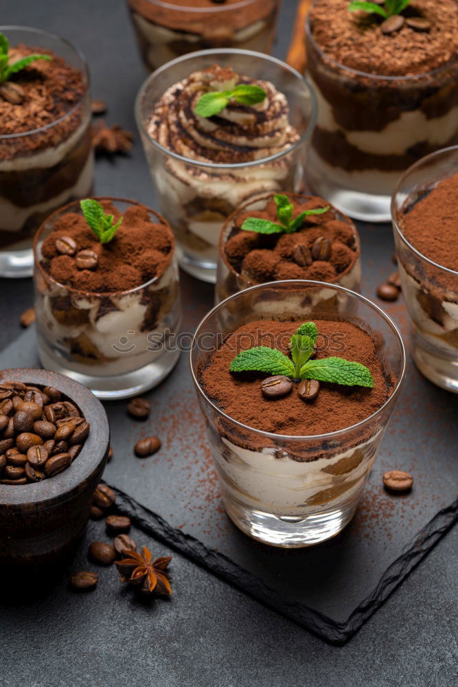 Similar – Image, Stock Photo white etagere with chocolate cake muffin and its preparation