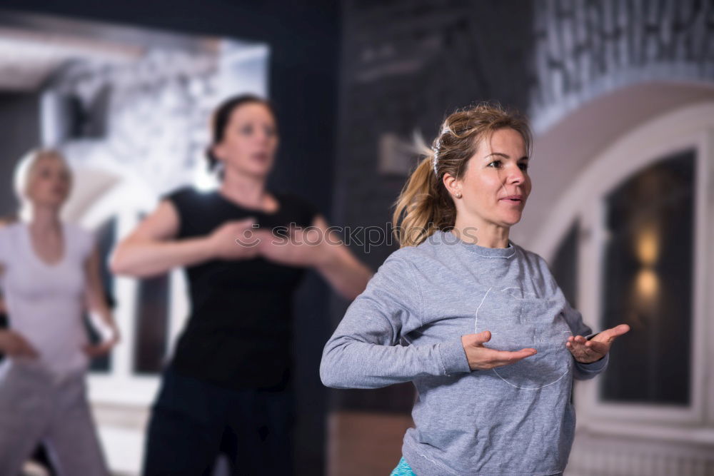 Similar – Image, Stock Photo People stretching back in a fitness class