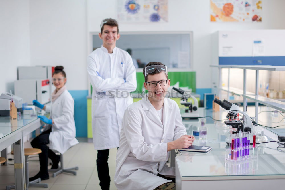 Image, Stock Photo Young man in lab