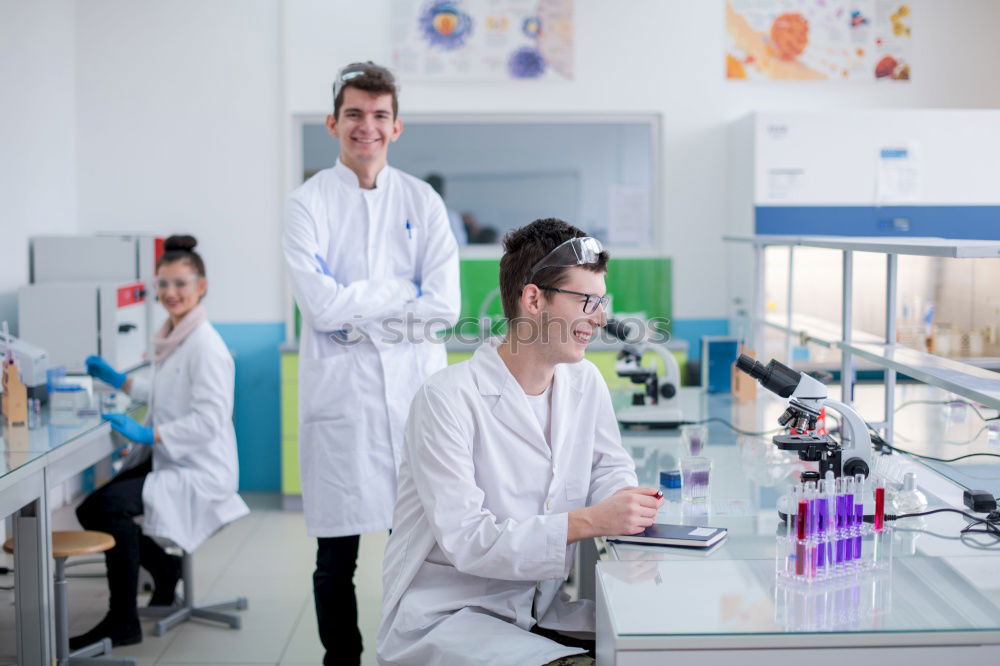 Similar – Image, Stock Photo Young man in lab