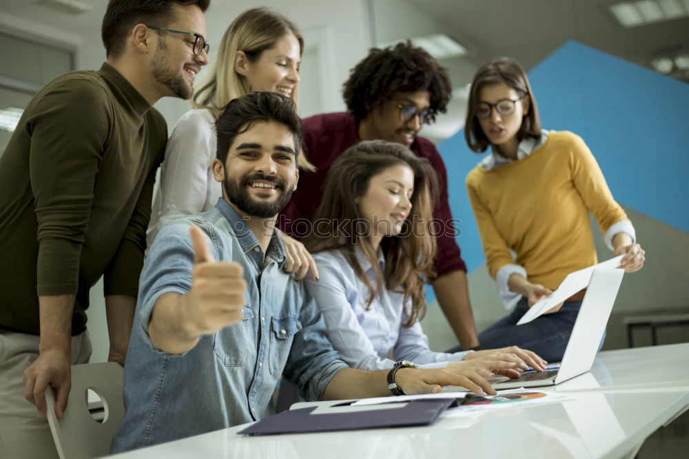 Similar – Image, Stock Photo Multiracial young people looking at a tablet computer