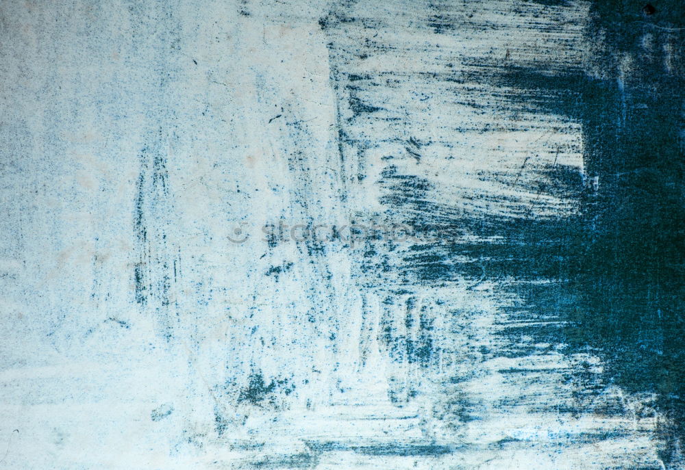 Blue paint on a grunge wall