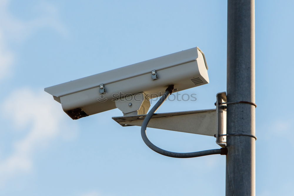 Similar – Industrial Security CCTV Camera installed on metal fence. The camera protects the industrial ground. Blue sky is on the background.