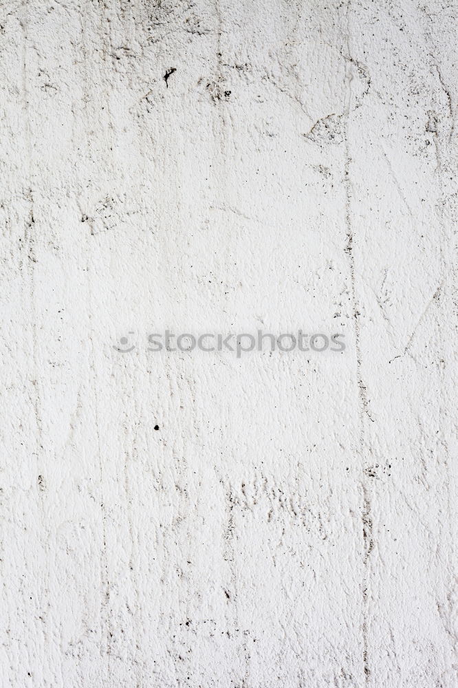 Similar – A piece of white adhesive tape over a crack in the plaster of a house wall