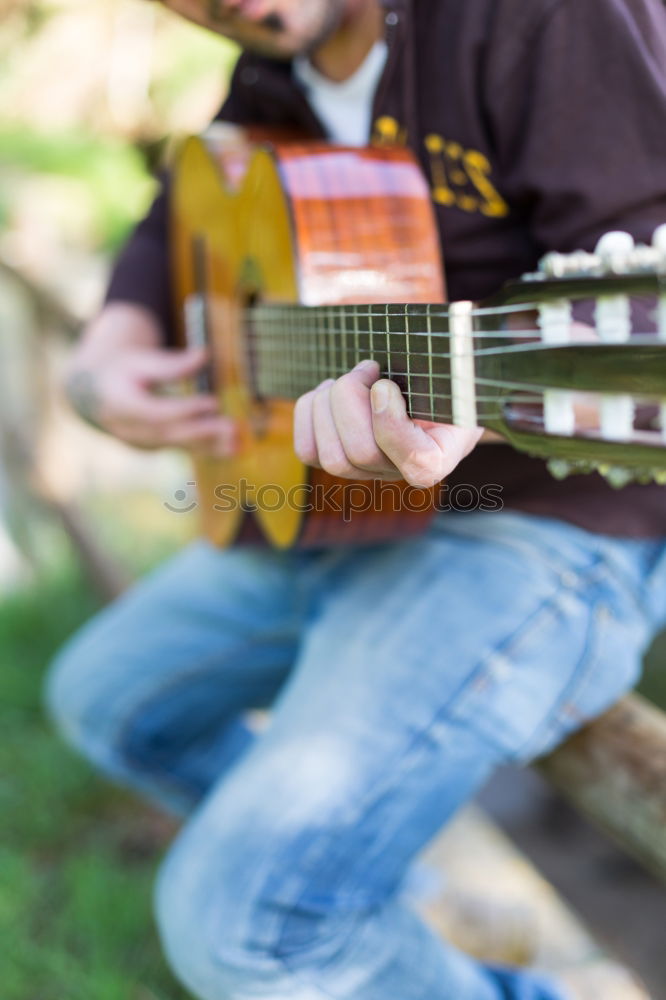 Similar – Image, Stock Photo Man playing guitar in nature