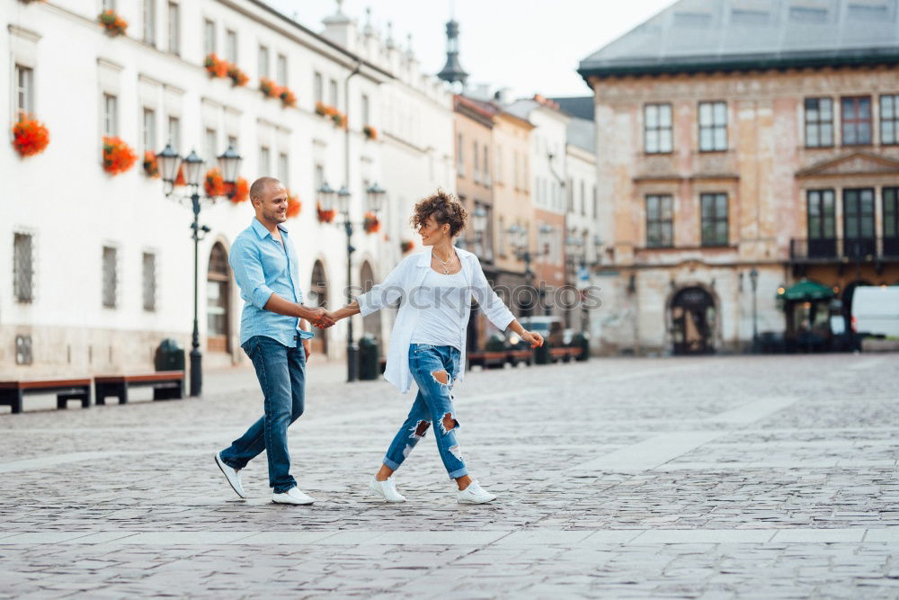 Similar – Retired couple out for a walk