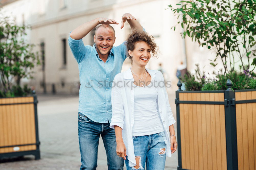 Smiling couple of lovers having fun.